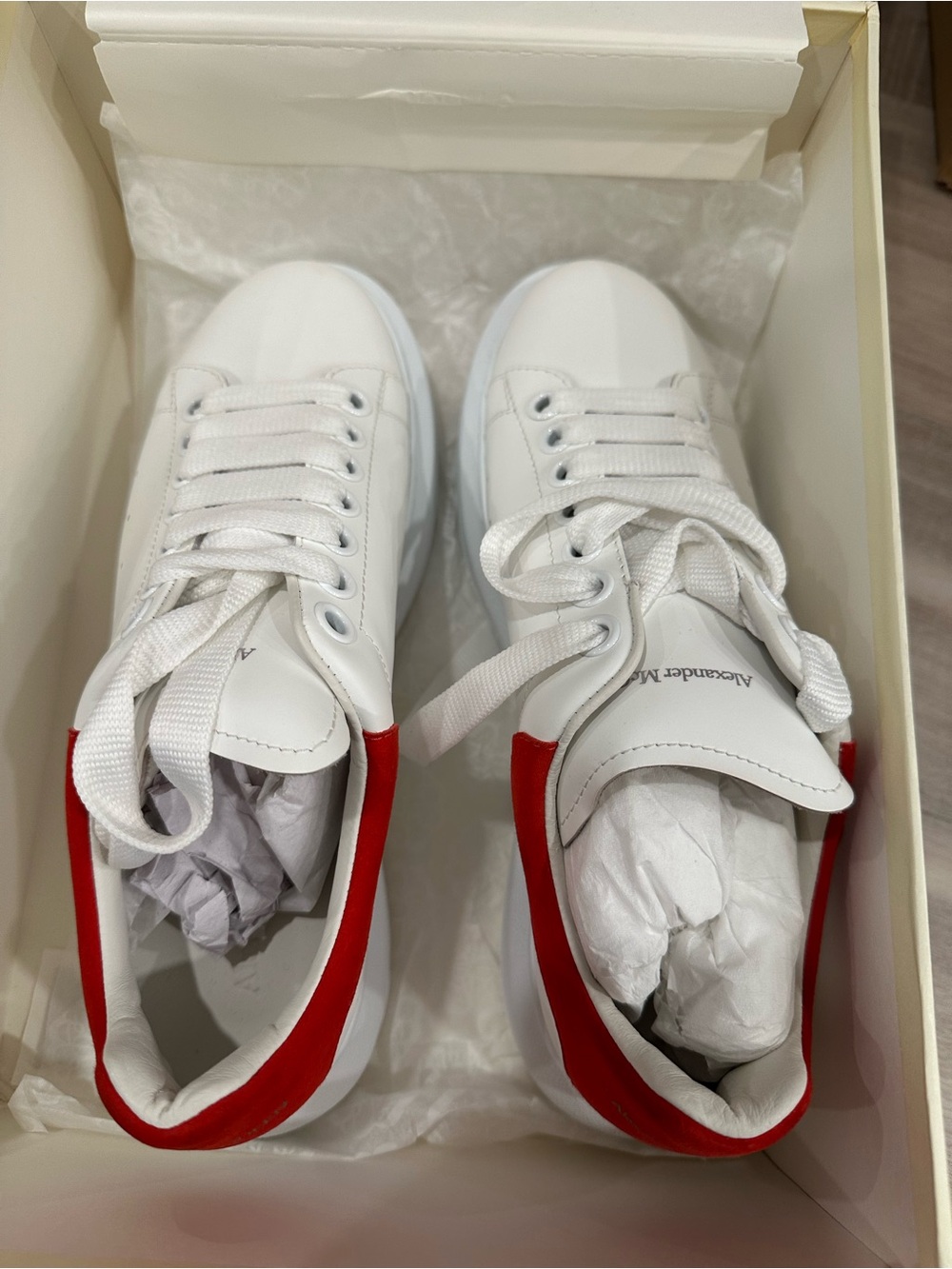 Alexander McQueen White Leather Low-Top Sneakers with Red Heel Accent